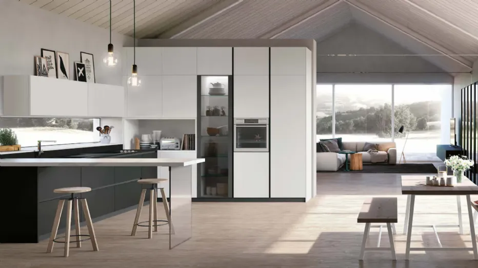 Matt black Pet base units, matt absolute white Pet wall units and columns. Ingo black Fenix ​​worktop. Calacatta laminate snack top.